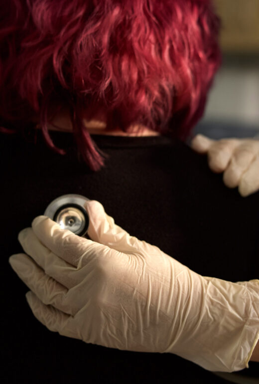 Healthcare provider using stethoscope
